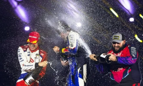 Vice Champion Podium Celebration - Drift Masters 2025 Piotr Więcek champagne celebration on Drift Masters podium with fellow racers